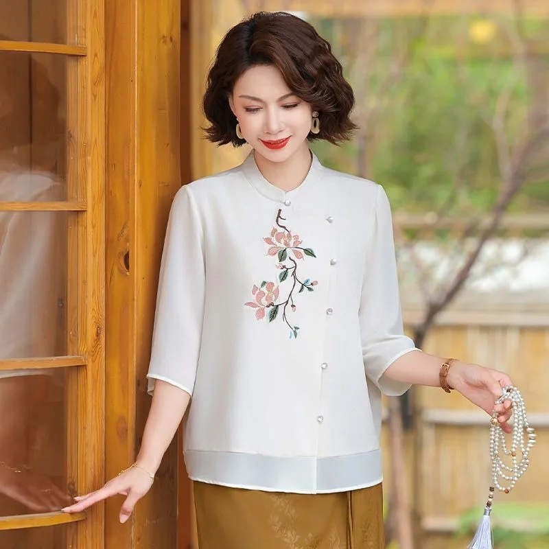 Middle Age Women's Chinese Style Mandarin Collar Blouse Floral Embroidery Elbow Sleeve Chiffon Fabric Loose Fit Casual TopYY248
Middle Age Women's Chinese Style Mandarin Collar Blouse Floral Embroidery Elbow Sleeve Chiffon Fabric Loose Fit Casual TopYY248