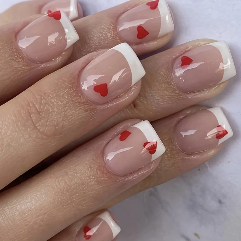 24Pcs Fake Nails Valentine's Day Short Style Heart-Shaped French Manicure Simple Delicate Glossy Finish Removable Press-On Nails
24Pcs Fake Nails Valentine's Day Short Style Heart-Shaped French Manicure Simple Delicate Glossy Finish Removable Press-On Nails