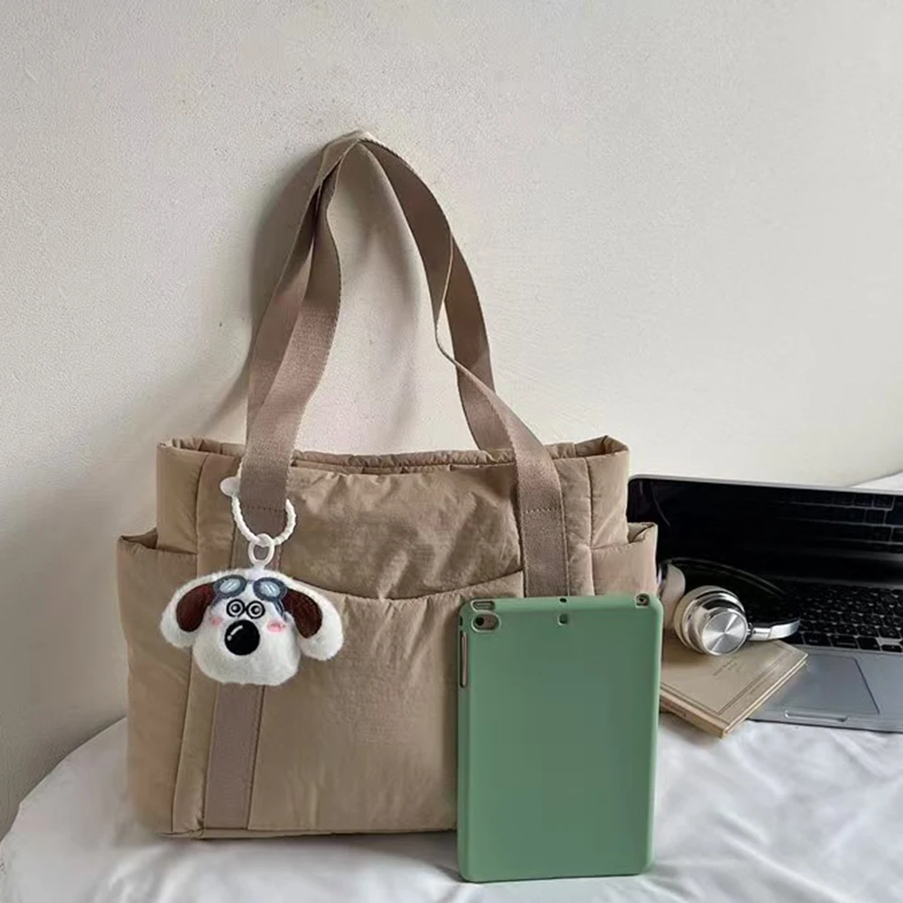 2025 Women's Autumn/Winter New Cotton Filled Handheld Tote Bag Large Capacity Single Shoulder Tote Bag Solid Color Tote Bag
2025 Women's Autumn/Winter New Cotton Filled Handheld Tote Bag Large Capacity Single Shoulder Tote Bag Solid Color Tote Bag