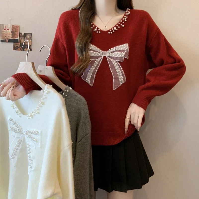 Women's bow pearl decoration V-neck sweater autumn and winter new style contrasting color French style elegant knit pullover
Women's bow pearl decoration V-neck sweater autumn and winter new style contrasting color French style elegant knit pullover