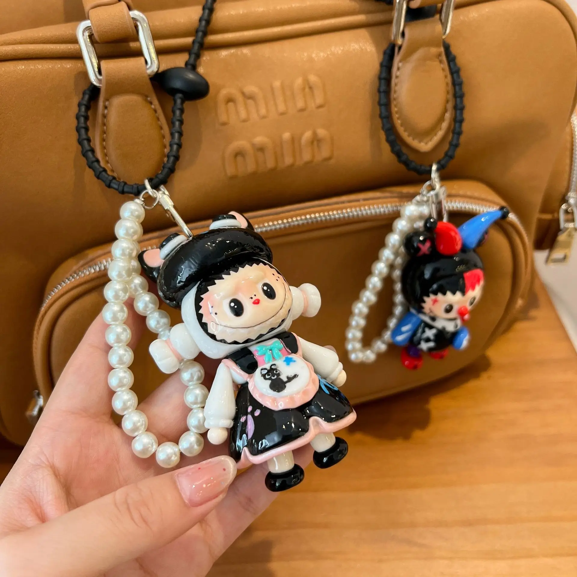 New handmade cartoon Labubu pearl keychain pendant cute backpack ornament mobile phone chain toy children's day gift
New handmade cartoon Labubu pearl keychain pendant cute backpack ornament mobile phone chain toy children's day gift