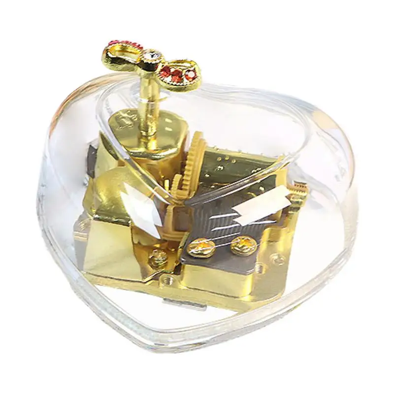 Clear Acrylic Music Box Heart-Shaped Music Box Wind Up Acrylic Musical Box Gold-Plated Transparent Musical Figurines With Bow
Clear Acrylic Music Box Heart-Shaped Music Box Wind Up Acrylic Musical Box Gold-Plated Transparent Musical Figurines With Bow