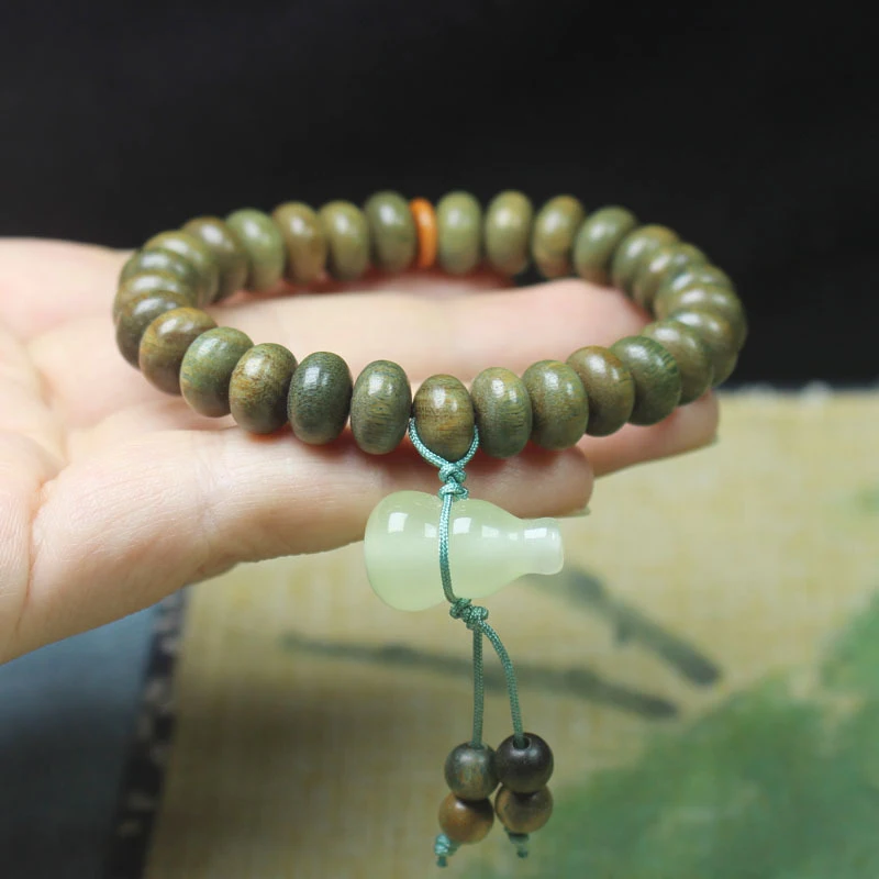 Green Sandalwood Abacus Bead DIY Bracelet with Luminous Gourd Tassel Pendant, Unisex Jewelry Prayer Beads
Green Sandalwood Abacus Bead DIY Bracelet with Luminous Gourd Tassel Pendant, Unisex Jewelry Prayer Beads