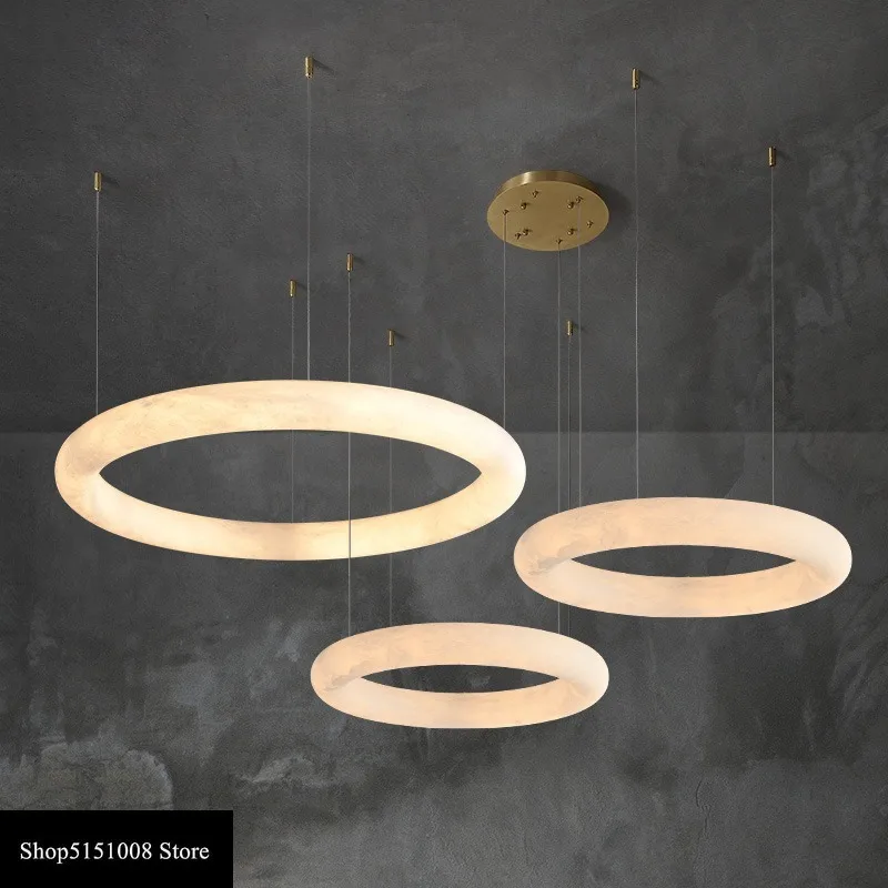 Modern LED Luxury Marble Ring Leather Gold Hanging Lamps For Ceiling Lustre Pendant Lights Suspension Chandelier For Living Room
Modern LED Luxury Marble Ring Leather Gold Hanging Lamps For Ceiling Lustre Pendant Lights Suspension Chandelier For Living Room