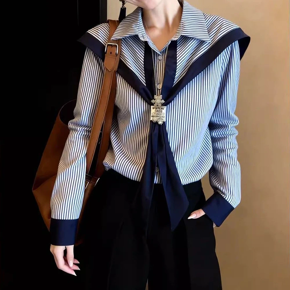 College style and thin daily commute loose and comfortable popular striped shirt women's 2026 early spring shawl shirt
College style and thin daily commute loose and comfortable popular striped shirt women's 2026 early spring shawl shirt