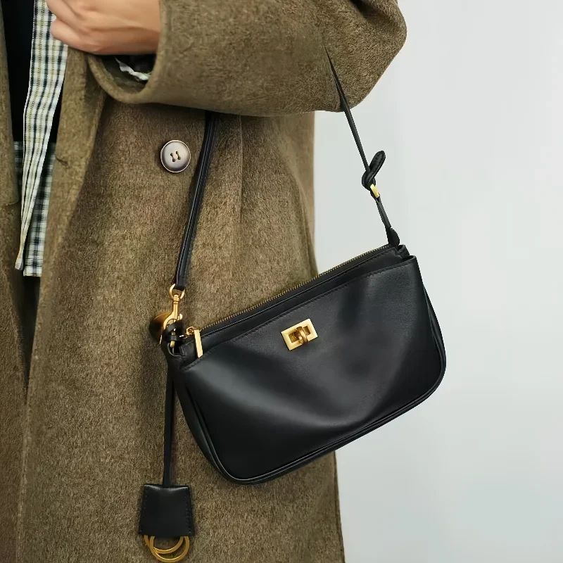 Классическая сумка через плечо из натуральной кожи, модная брендовая роскошная простая высококачественная повседневная сумка-мессенджер для поездок на работу под мышками, женская сумка
Классическая сумка через плечо из натуральной кожи, модная брендовая роскошная простая высококачественная повседневная сумка-мессенджер для поездок на работу под мышками, женская сумка