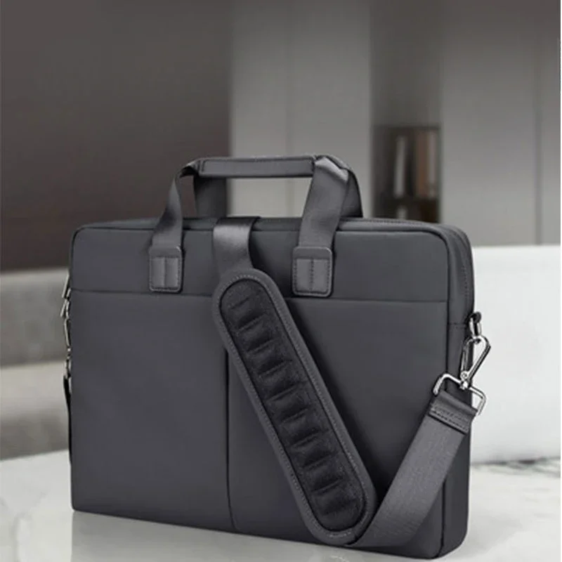One shoulder portable oblique span computer bag, large capacity waterproof and wear-resistant laptop, notebook storage liner
One shoulder portable oblique span computer bag, large capacity waterproof and wear-resistant laptop, notebook storage liner