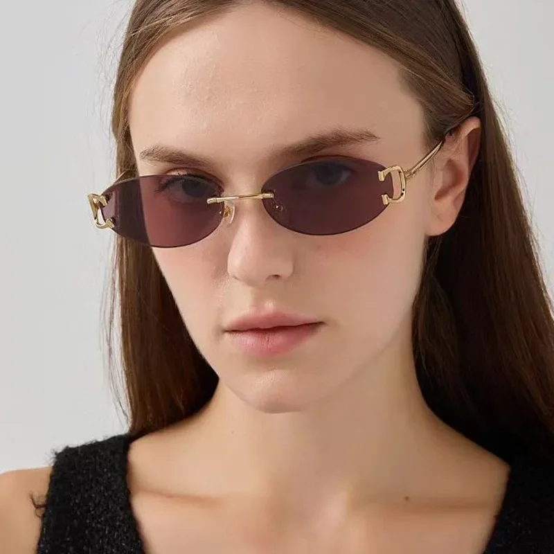 2025 Frameless Oval Cut Edge Sunglasses New Fashion Street Style Women Small Frame Sunglasses High-End Luxury Simple Sun Glasses
2025 Frameless Oval Cut Edge Sunglasses New Fashion Street Style Women Small Frame Sunglasses High-End Luxury Simple Sun Glasses