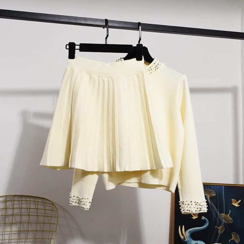 Autumn Winter Women Two-piece Sets Beading Long Sleeve Knitted Sweater Pullover Top + Elastic High Waist Pleated Skirts Suit
Autumn Winter Women Two-piece Sets Beading Long Sleeve Knitted Sweater Pullover Top + Elastic High Waist Pleated Skirts Suit