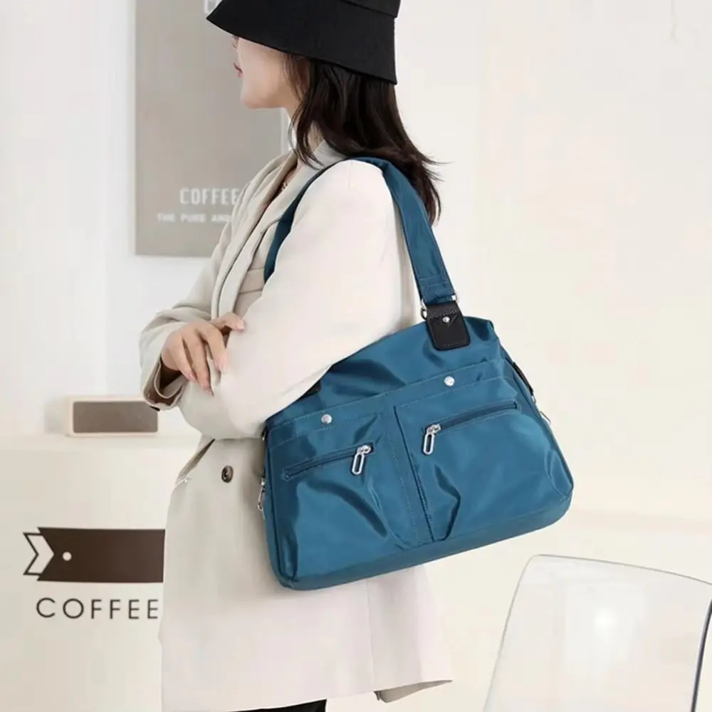 Messenger Bags Nylo Shoulder Bag Multi-pocket Large Capacity Casual Tote Bag Lightweight Solid Color Underarm Packs Daily
Messenger Bags Nylo Shoulder Bag Multi-pocket Large Capacity Casual Tote Bag Lightweight Solid Color Underarm Packs Daily