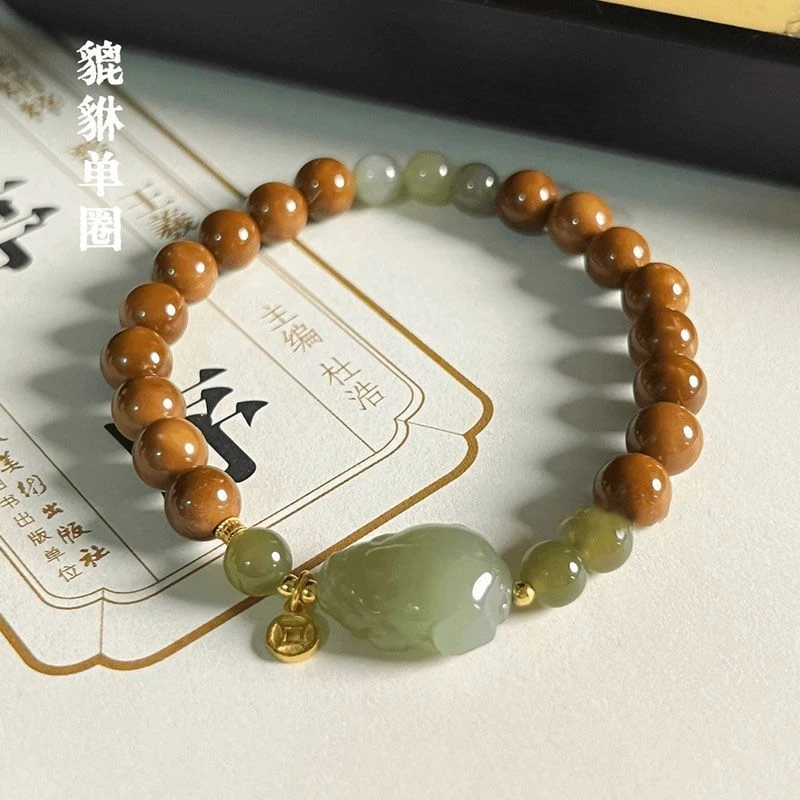 Natural Hetian Jade and Sandalwood Pixiu for Women, Vintage Niche New Chinese Style, High-End Bodhi Fortune Bracelet
Natural Hetian Jade and Sandalwood Pixiu for Women, Vintage Niche New Chinese Style, High-End Bodhi Fortune Bracelet