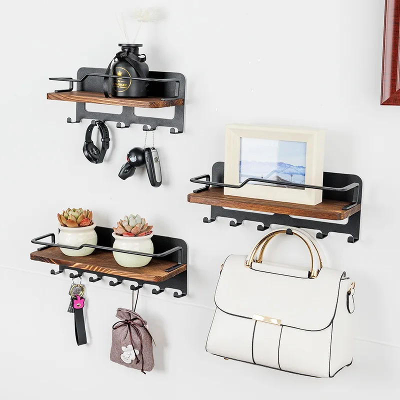 Key hooks at the door, magnetic hooks behind the door, and wall-mounted storage racks at the entrance
Key hooks at the door, magnetic hooks behind the door, and wall-mounted storage racks at the entrance