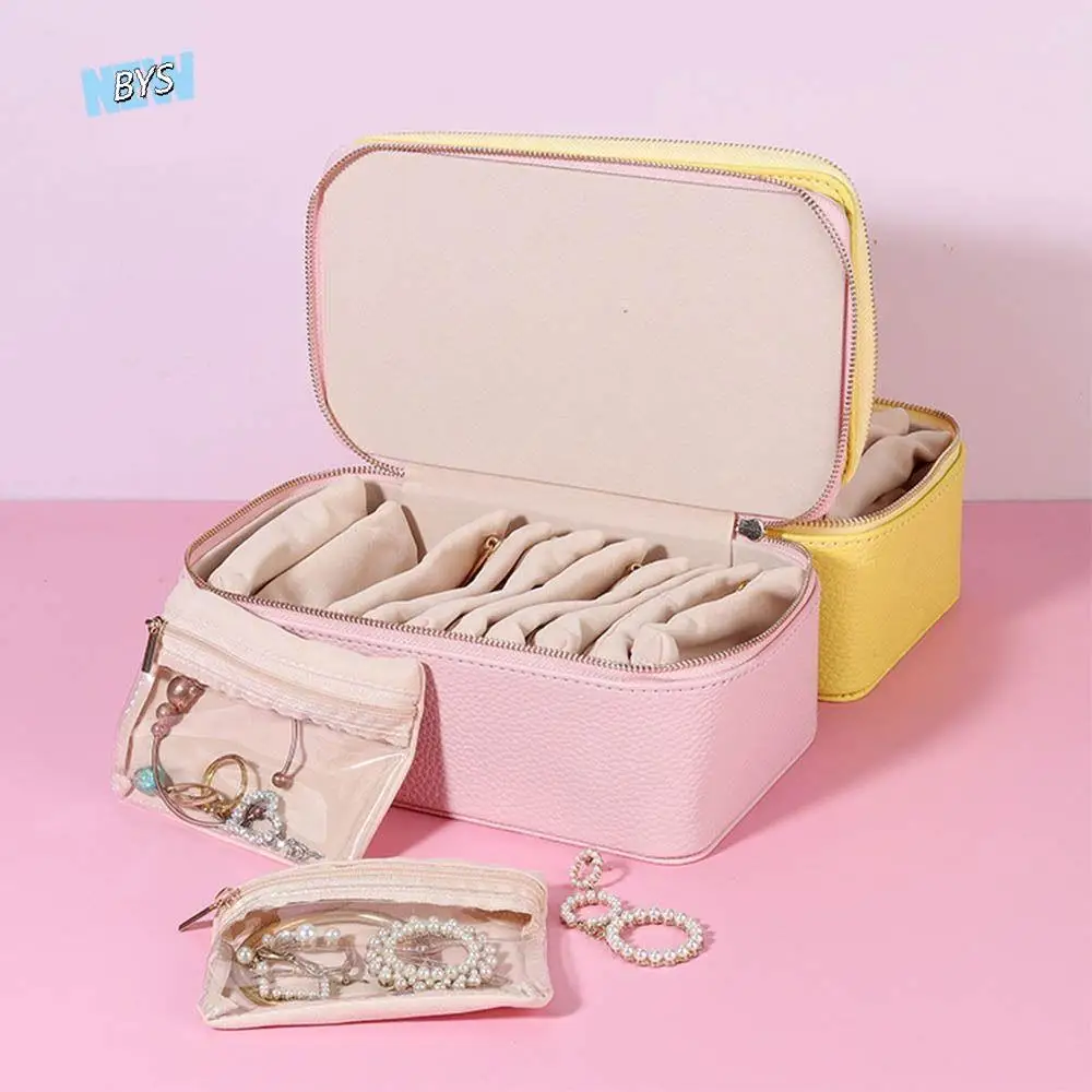 Портативная пылезащитная шкатулка для драгоценностей из искусственной кожи с 12 маленькими сумками, чехол для хранения ювелирных изделий из искусственной кожи, органайзер для ювелирных изделий, коробка, подарок
Портативная пылезащитная шкатулка для драгоценностей из искусственной кожи с 12 маленькими сумками, чехол для хранения ювелирных изделий из искусственной кожи, органайзер для ювелирных изделий, коробка, подарок