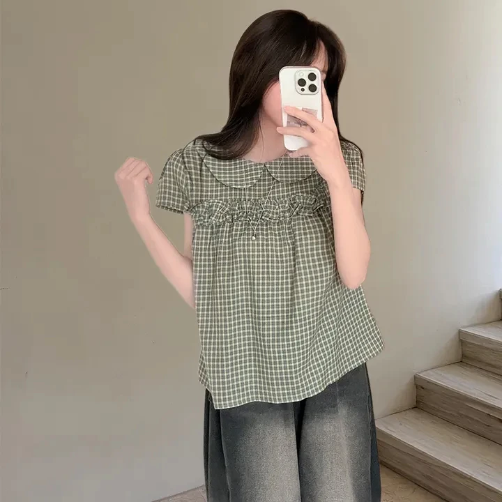 Korean Sweet Wood Grain Splicing Doll Collar Small Flying Sleeve Plaid Shirt Women's Summer Fashion Age Reduction Top
Korean Sweet Wood Grain Splicing Doll Collar Small Flying Sleeve Plaid Shirt Women's Summer Fashion Age Reduction Top