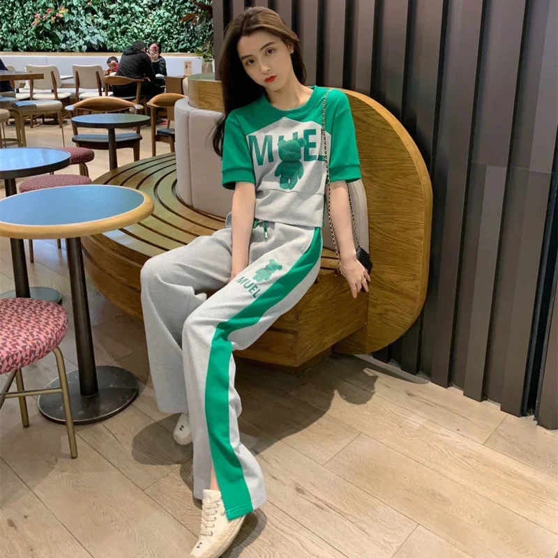 Women's Sweat Suit 2025 Spring Summer New Fashion Korean Short Sleeved T-shirt Tops Pants 2 Two Piece Sets Female Casual Clothes
Women's Sweat Suit 2025 Spring Summer New Fashion Korean Short Sleeved T-shirt Tops Pants 2 Two Piece Sets Female Casual Clothes