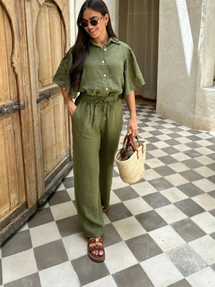 Женский брючный костюм на хлопковой подкладке с лацканами и половиной рукава, однобортные рубашки, широкие брюки, женские комплекты, летние пляжные наряды 2023 г.
Женский брючный костюм на хлопковой подкладке с лацканами и половиной рукава, однобортные рубашки, широкие брюки, женские комплекты, летние пляжные наряды 2023 г.