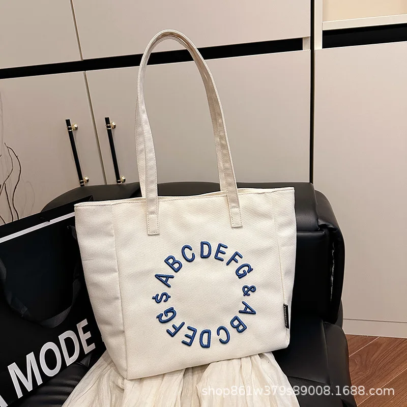 2025 Trendy Women's Canvas Tote Bag Large Capacity Simple Shoulder Purse Boho Letter Print Casual Handbag for College & Outings
2025 Trendy Women's Canvas Tote Bag Large Capacity Simple Shoulder Purse Boho Letter Print Casual Handbag for College & Outings