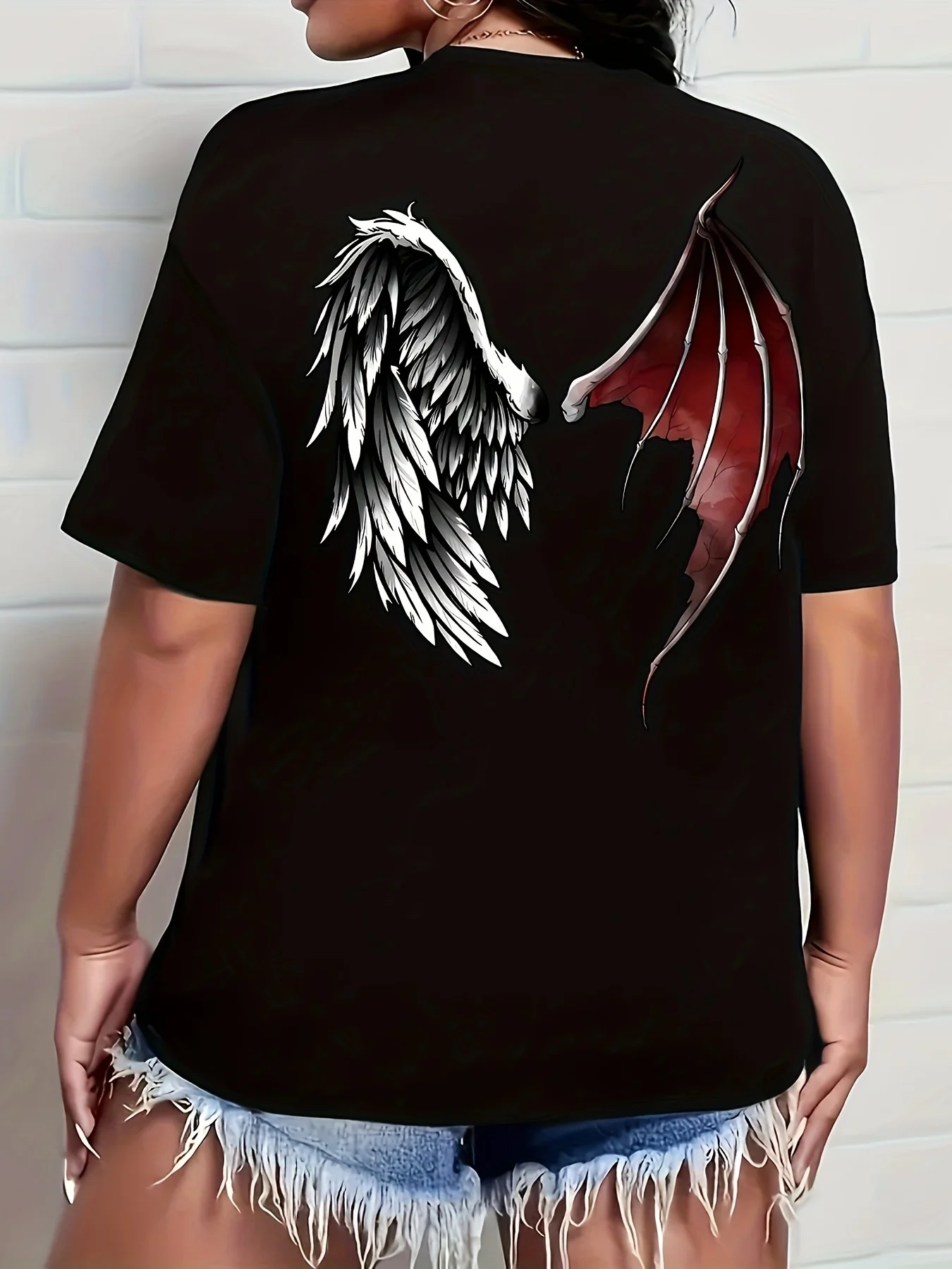 Plus - Size Women's Black Short - Sleeve T - shirt, Black & White Wings Print, Edgy & Trendy
Plus - Size Women's Black Short - Sleeve T - shirt, Black & White Wings Print, Edgy & Trendy