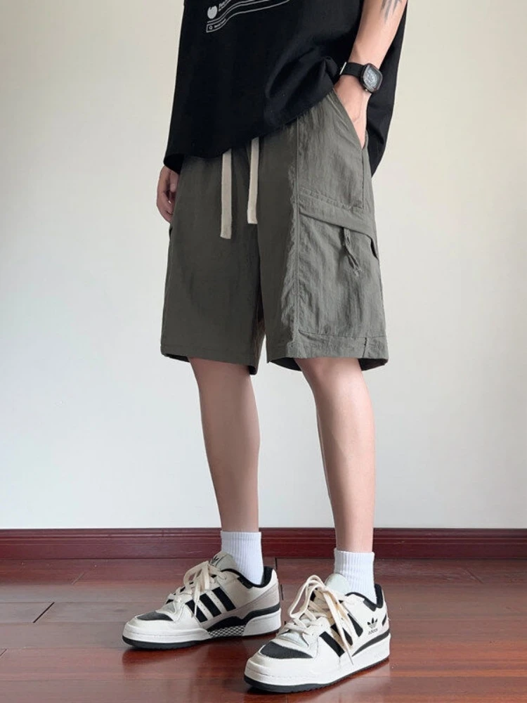 Мужские шорты из ледяного шелка, летние, свободные, прямые, рабочие, тонкие, дышащие, быстросохнущие, спортивные, повседневные, длиной до колена
Мужские шорты из ледяного шелка, летние, свободные, прямые, рабочие, тонкие, дышащие, быстросохнущие, спортивные, повседневные, длиной до колена