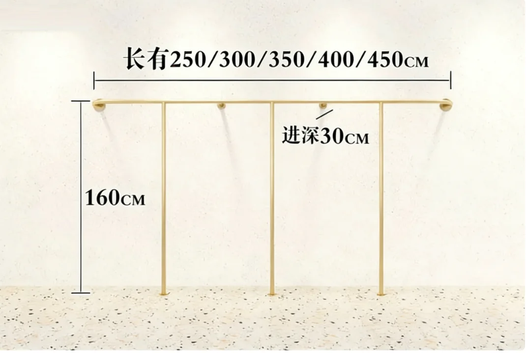 Clothing store display shelves for children's and women's clothing, wall mounted shelves with golden crossbars for hanging cloth
Clothing store display shelves for children's and women's clothing, wall mounted shelves with golden crossbars for hanging cloth