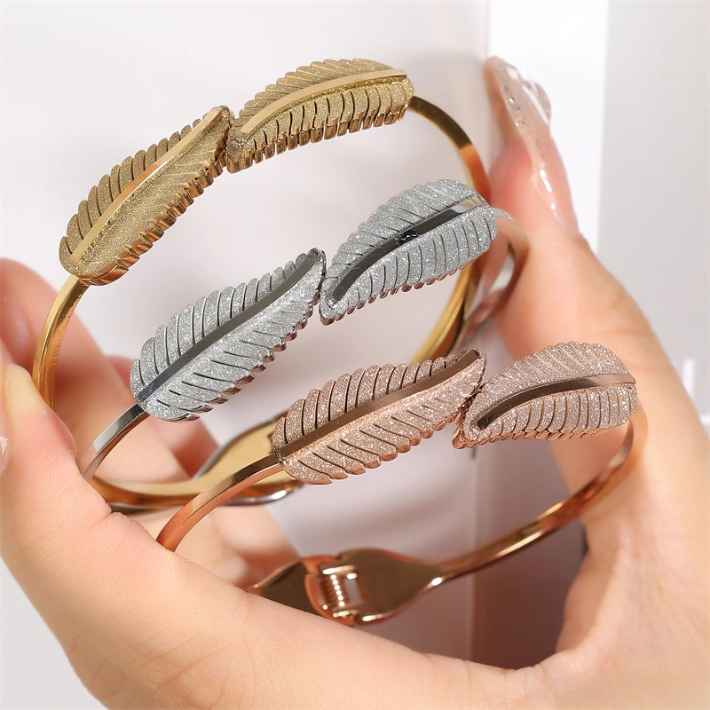 FEEHOW Vintage Simple Feather Shaped Open Bangles Stainless Steel Leaf Cuff Bangles Bracelets for Women Jewelry Gift
FEEHOW Vintage Simple Feather Shaped Open Bangles Stainless Steel Leaf Cuff Bangles Bracelets for Women Jewelry Gift
