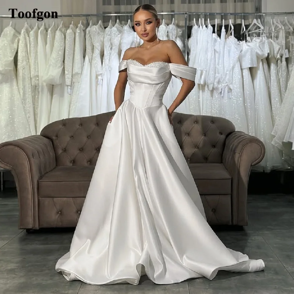 Toofgon A Line Satin Customized Bride Wedding Dresses Formal Bridal Gowns Pearls Sweetheart Women Wedding Photography Dress 2025
Toofgon A Line Satin Customized Bride Wedding Dresses Formal Bridal Gowns Pearls Sweetheart Women Wedding Photography Dress 2025