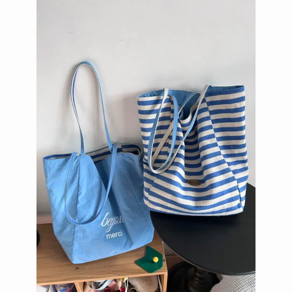 Double Side Canvas Bag Blue Shoulder Bags for Summer Vocation Beach Outfit Large Capacity Underarm Bags Tote Bags for Women
Double Side Canvas Bag Blue Shoulder Bags for Summer Vocation Beach Outfit Large Capacity Underarm Bags Tote Bags for Women