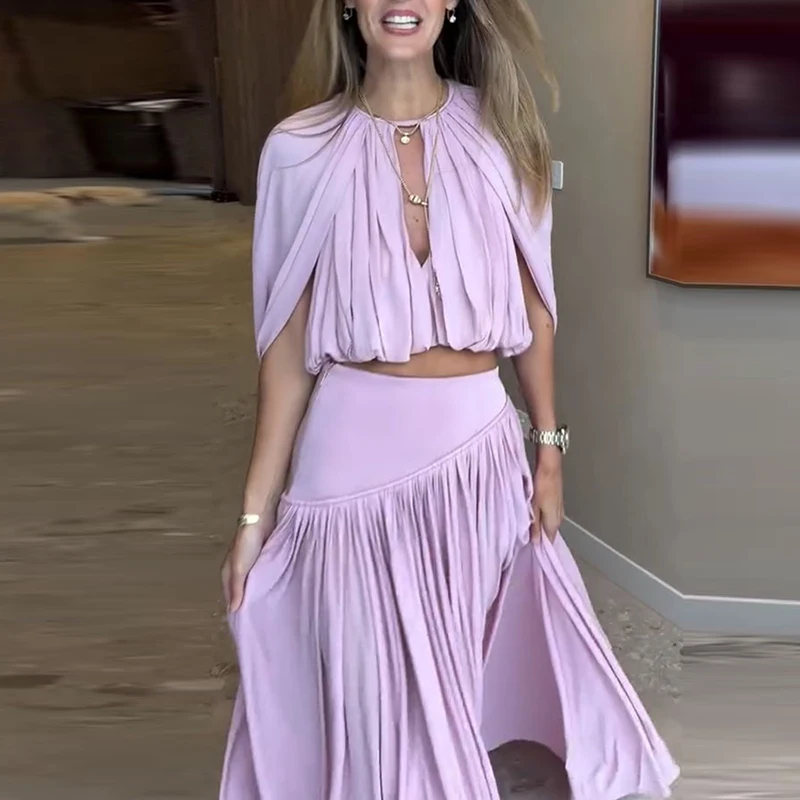 Chic Fashion Solid Color Party Outfit Women O Neck Hollow Top And Pleated Maxi Skirts Set Summer Cloak Sleeves Loose Office Suit
Chic Fashion Solid Color Party Outfit Women O Neck Hollow Top And Pleated Maxi Skirts Set Summer Cloak Sleeves Loose Office Suit