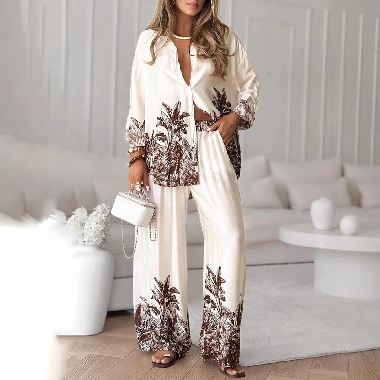 New hot-selling European and American fashion positioning printed cardigan long-sleeved top wide-leg pants two-piece set
New hot-selling European and American fashion positioning printed cardigan long-sleeved top wide-leg pants two-piece set