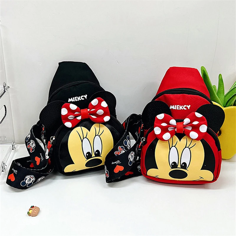 Набор из 1/2 шт. сумок через плечо Disney Minnie – классический дизайн с красным бантом и в горошек, регулируемая поясная сумка для повседневного использования.
Набор из 1/2 шт. сумок через плечо Disney Minnie – классический дизайн с красным бантом и в горошек, регулируемая поясная сумка для повседневного использования.