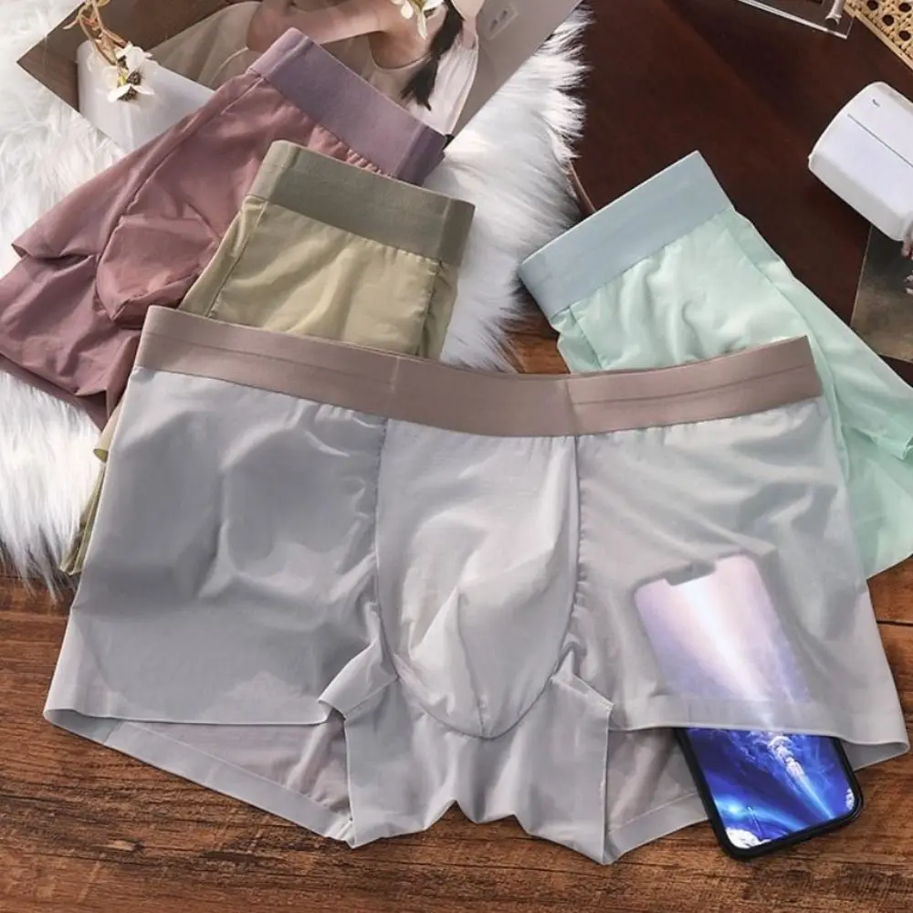 Simple Solid Color Men's Boxer Briefs Ultra-thin Cool Feeling Seamless Underpants Quick Dry Lingerie Ice Silk Boxers Male
Simple Solid Color Men's Boxer Briefs Ultra-thin Cool Feeling Seamless Underpants Quick Dry Lingerie Ice Silk Boxers Male