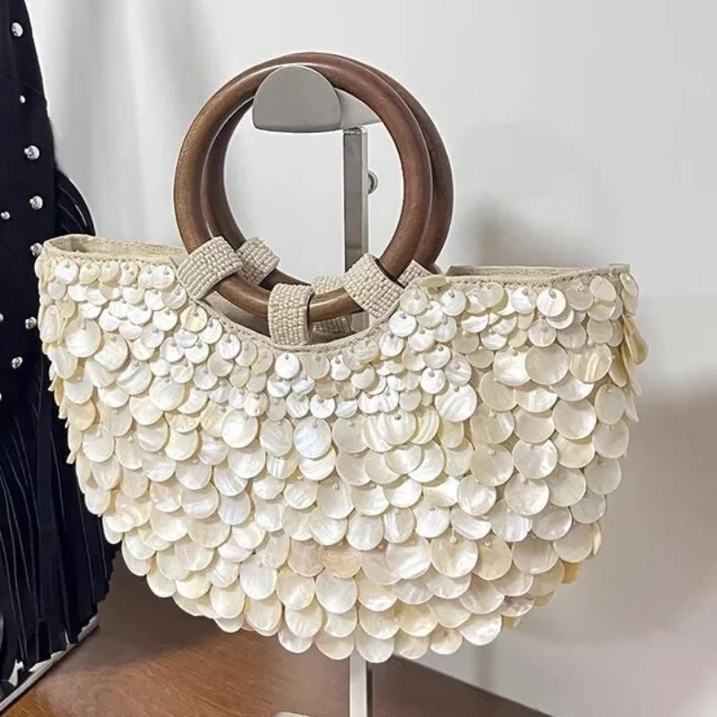 2025 Spring and Summer New High-end Pure Handmade Natural Shell Bag Fairy Portable Girl Bag Niche Bag Personality Trend
2025 Spring and Summer New High-end Pure Handmade Natural Shell Bag Fairy Portable Girl Bag Niche Bag Personality Trend