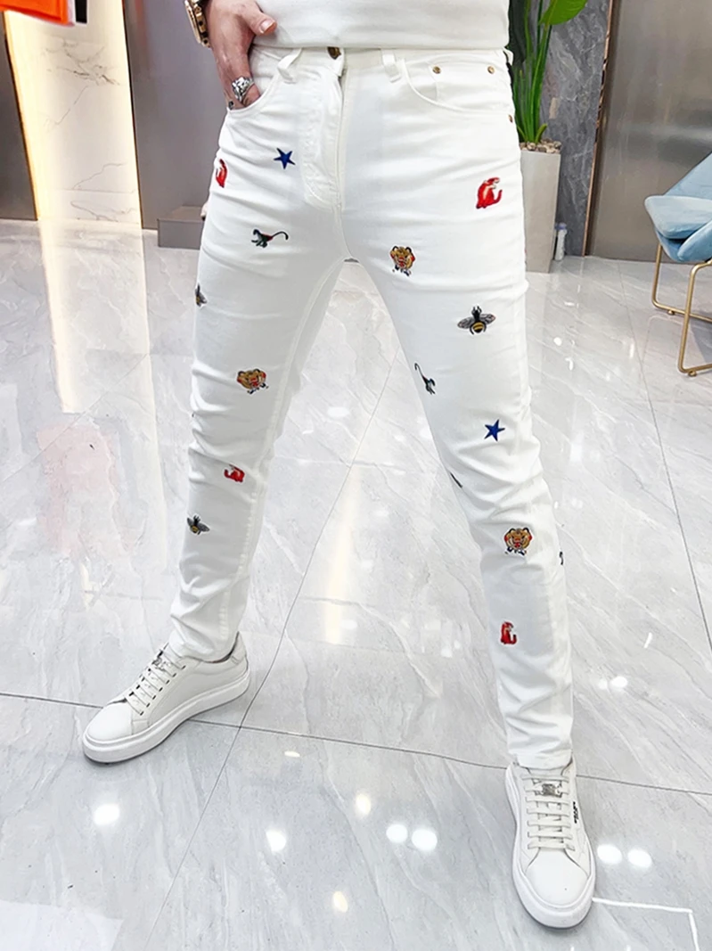 Summer 2026 Men's Slim Fit White Jeans Trendy Brand Cartoon Embroidery Korean Style Fashionable Casual Long Pants Youth
Summer 2026 Men's Slim Fit White Jeans Trendy Brand Cartoon Embroidery Korean Style Fashionable Casual Long Pants Youth