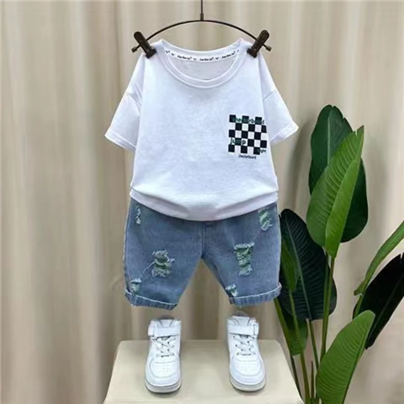 Summer Fashion Baby Boys Outfits Plaid Cotton Short Sleeve T-shirt+Denim Shorts 2pcs Set Kids Sports Outfits Baby Girls Clothes
Summer Fashion Baby Boys Outfits Plaid Cotton Short Sleeve T-shirt+Denim Shorts 2pcs Set Kids Sports Outfits Baby Girls Clothes