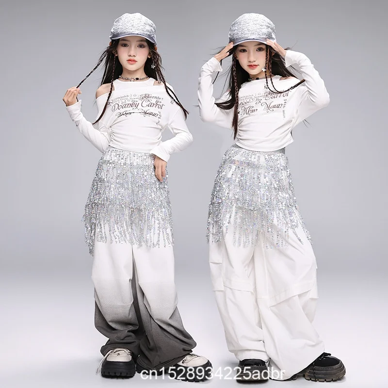 Костюм для джазового танца в стиле хип-хоп для девочек, корейское издание, костюм с блестками, уличный танцевальный детский модный костюм, костюм для группового выступления
Костюм для джазового танца в стиле хип-хоп для девочек, корейское издание, костюм с блестками, уличный танцевальный детский модный костюм, костюм для группового выступления