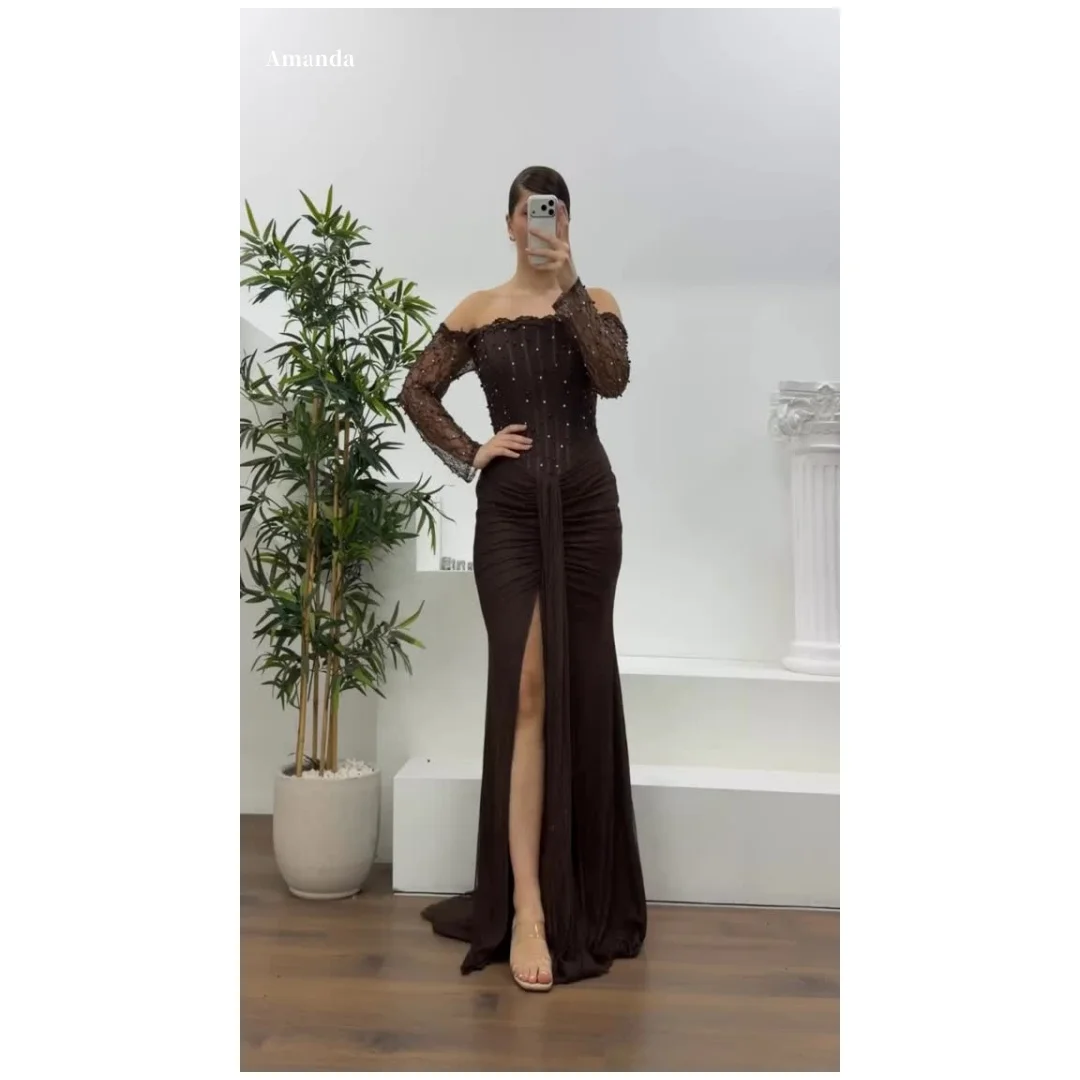 Amanda Customized Chocolate Off Shoulder Prom Dress with Sheer Lace Long Sleeves Beaded Bodice and Ruched High Slit Skirt 2026
Amanda Customized Chocolate Off Shoulder Prom Dress with Sheer Lace Long Sleeves Beaded Bodice and Ruched High Slit Skirt 2026