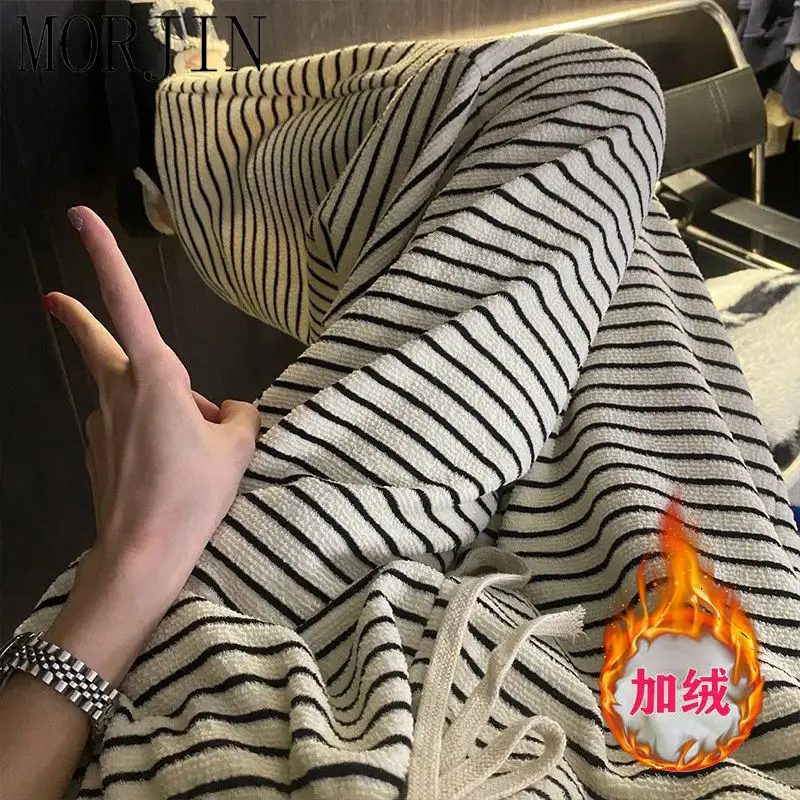 Autumn and winter new plus velvet thick striped wide leg women's loose casual versatile high waist elasticity pants
Autumn and winter new plus velvet thick striped wide leg women's loose casual versatile high waist elasticity pants