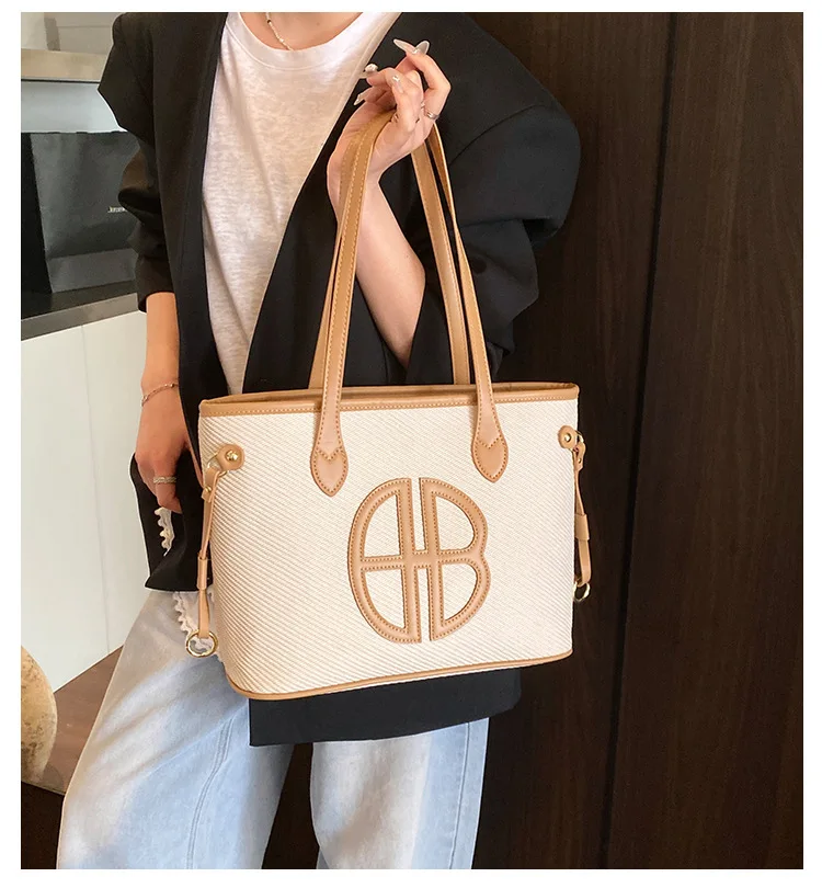 2025 New Women's Canvas Tote Bag Large Capacity Casual Shoulder Bag for Work School Trendy Crossbody Purse Student Commuter Bag
2025 New Women's Canvas Tote Bag Large Capacity Casual Shoulder Bag for Work School Trendy Crossbody Purse Student Commuter Bag