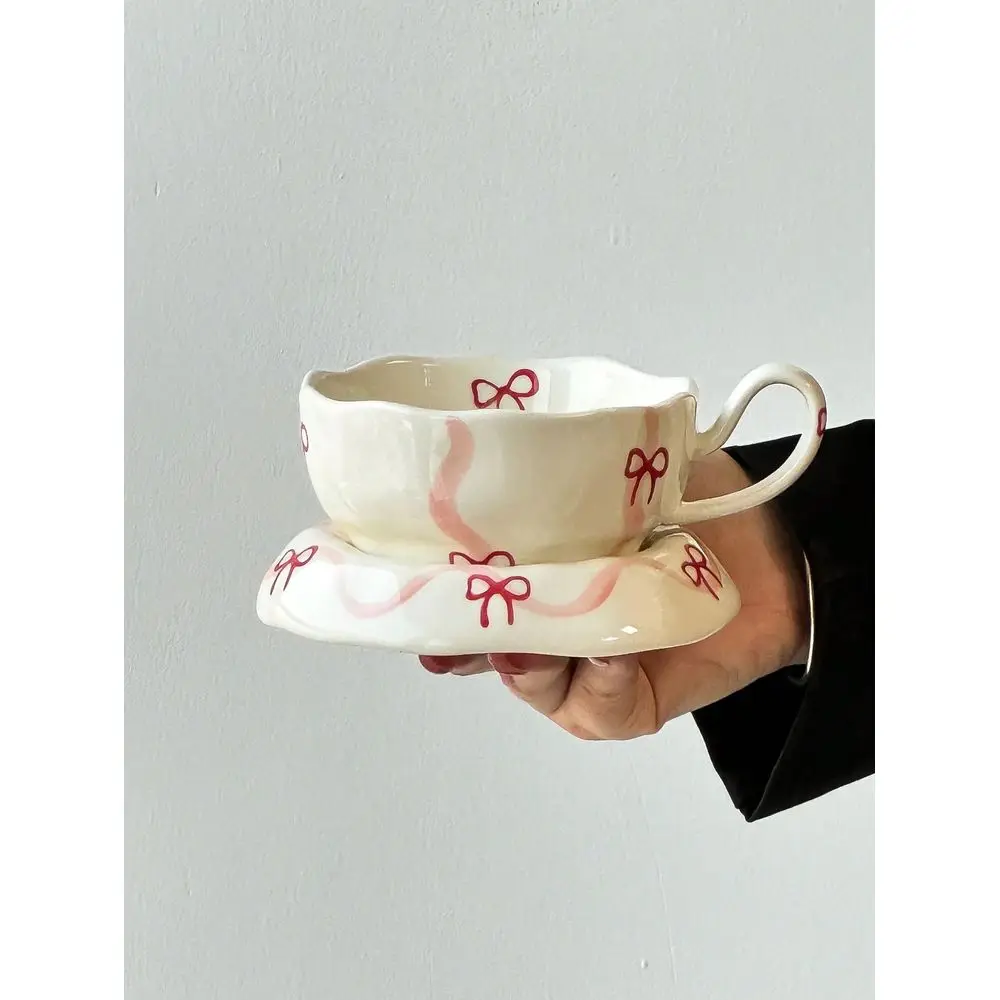 HandPainted Retro Ceramic Cup Saucer Set, French Countryside Style Pink Rose Bow Ceramic Coffee Cup Saucer, PetalShaped Cup Rim
HandPainted Retro Ceramic Cup Saucer Set, French Countryside Style Pink Rose Bow Ceramic Coffee Cup Saucer, PetalShaped Cup Rim