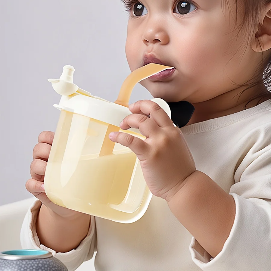 Kids training straw milk cup with scale, easy reading, weaning transition, anti-choke spout, drinking trainer.
Kids training straw milk cup with scale, easy reading, weaning transition, anti-choke spout, drinking trainer.