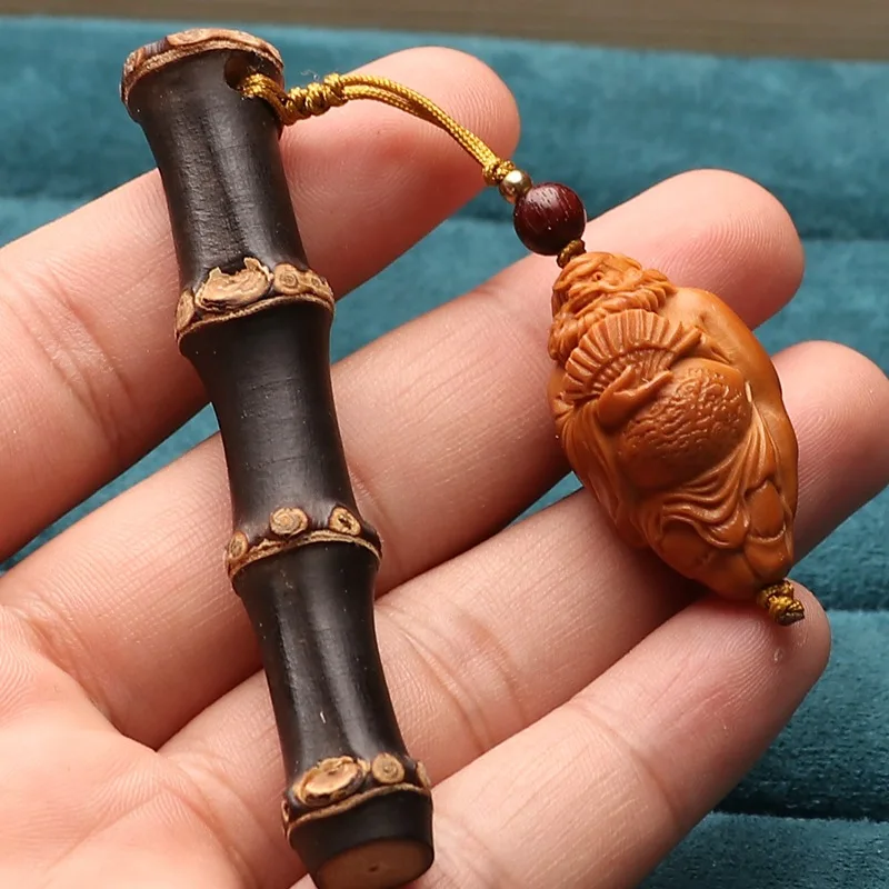 Purple bamboo root handle carving olive Zhong Kui Statue Solid Wood Handheld Art gift
Purple bamboo root handle carving olive Zhong Kui Statue Solid Wood Handheld Art gift
