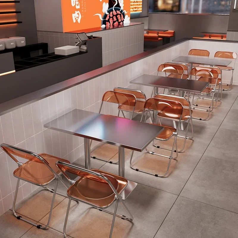 Stainless steel table and chair combination barbecue shop folding chair theme Western restaurant industrial style chair
Stainless steel table and chair combination barbecue shop folding chair theme Western restaurant industrial style chair