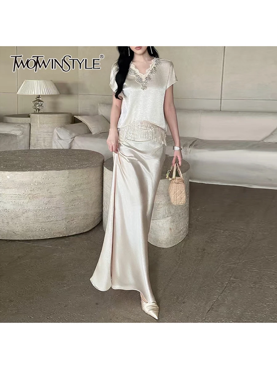 TWOTWINSTYL Spliced Dianmods Two Piece Set For Women V Neck Short Sleeve Patchwork Tassels Top High Waist Skirt Sets Female New
TWOTWINSTYL Spliced Dianmods Two Piece Set For Women V Neck Short Sleeve Patchwork Tassels Top High Waist Skirt Sets Female New