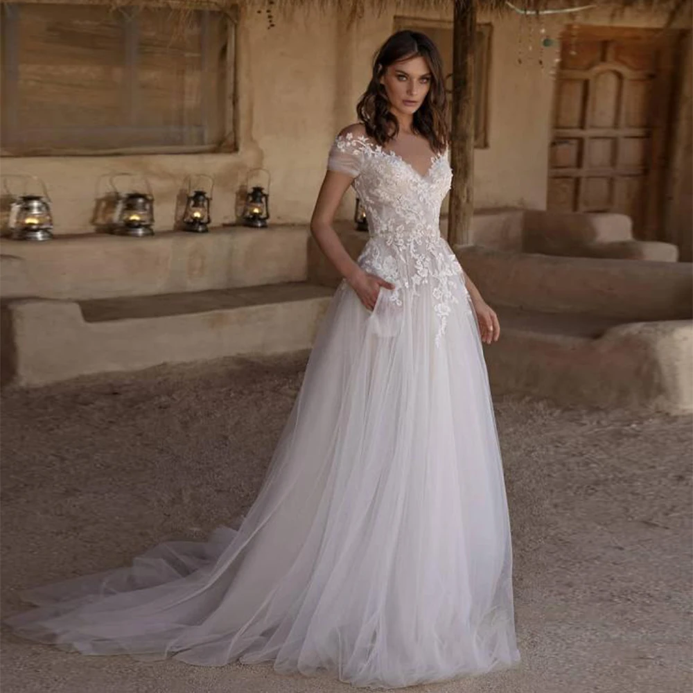 Bohemian Wedding Dresses Women's Sexy V-Neck Tulle Bride Gowns Lace Applique A-Shaped Robe 2023 Vestidos De Novia свадебное плат
Bohemian Wedding Dresses Women's Sexy V-Neck Tulle Bride Gowns Lace Applique A-Shaped Robe 2023 Vestidos De Novia свадебное плат