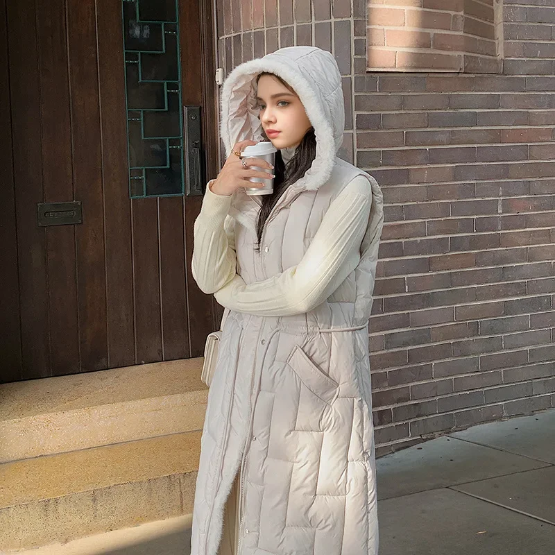2024 New Long Parkas Vest for Women Autumn Winter Korean Fashion Sleeveless Hooded Down Cotton Jacket Thicken Warm Elegant Coat
2024 New Long Parkas Vest for Women Autumn Winter Korean Fashion Sleeveless Hooded Down Cotton Jacket Thicken Warm Elegant Coat