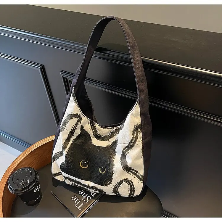 2025 Новая женская сумка контрастных цветов — популярная сумка Black Cat Tote, нишевая весенняя сумка через плечо на молнии
2025 Новая женская сумка контрастных цветов — популярная сумка Black Cat Tote, нишевая весенняя сумка через плечо на молнии
