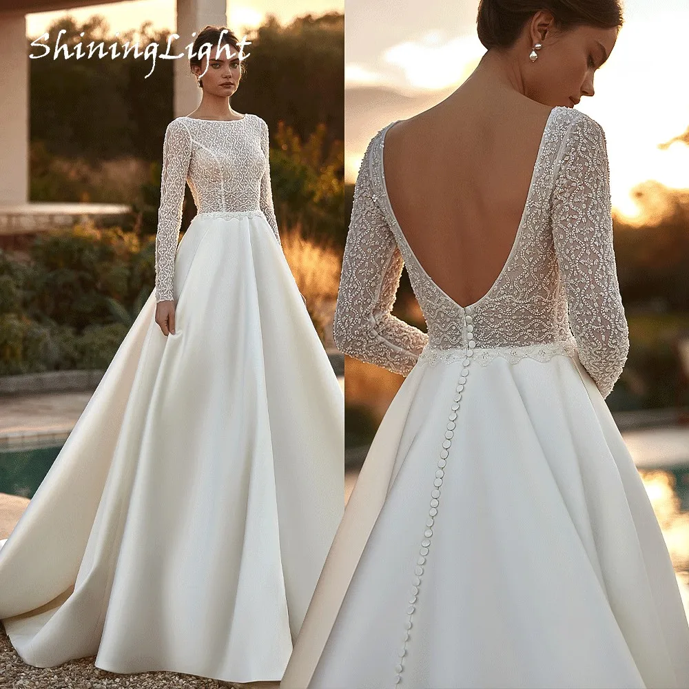 ShiningLight Long Sleeves Lace Backless Wedding Dresses O-Neck Classic Satin A Line Bride Gowns Vestido De Novia Customized
ShiningLight Long Sleeves Lace Backless Wedding Dresses O-Neck Classic Satin A Line Bride Gowns Vestido De Novia Customized