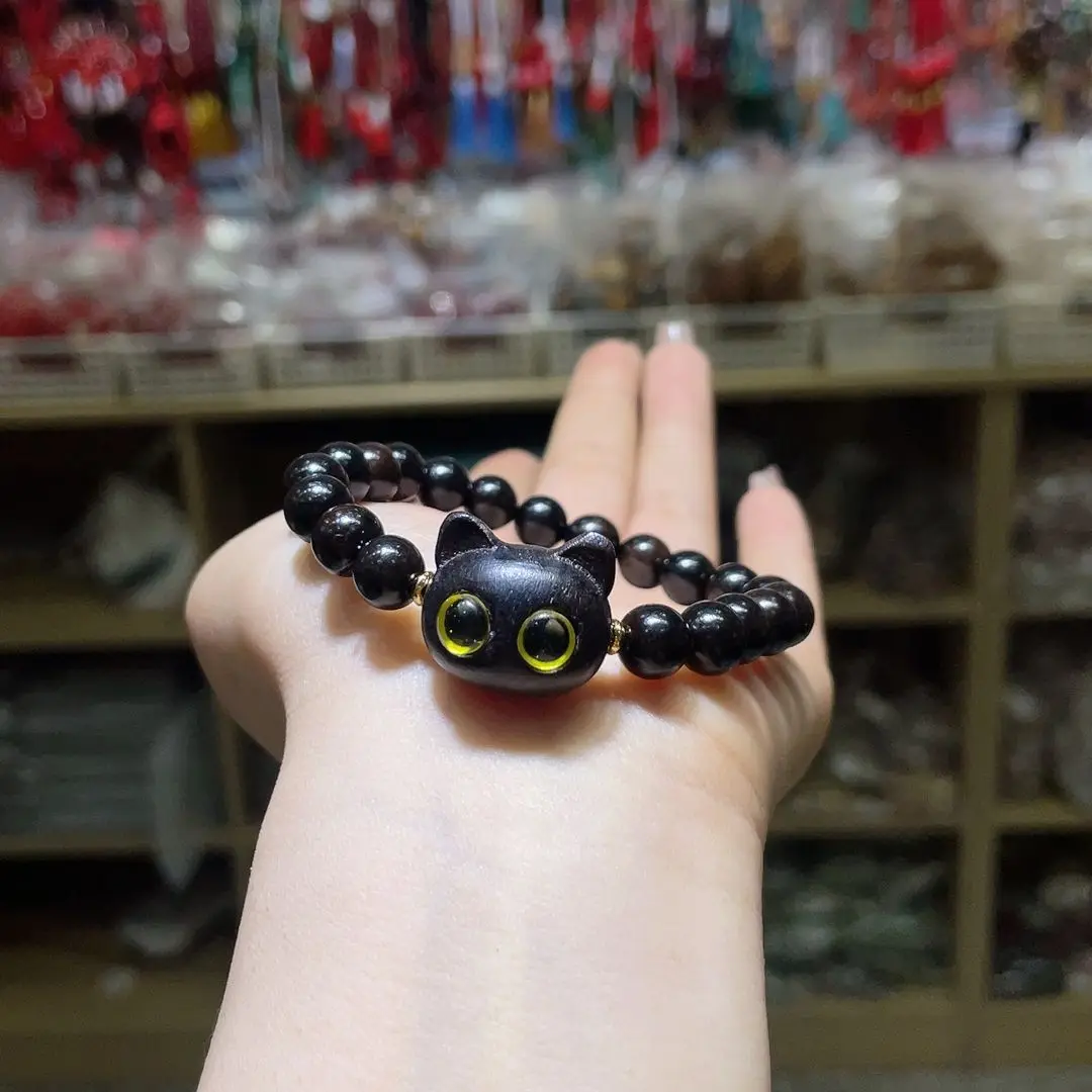 Black Sandalwood Cat Head Bracelet, Kitten Wenwan Bracelet, Simple Wooden Handicrafts, Exquisite Hand Jewelry, The Same for Men
Black Sandalwood Cat Head Bracelet, Kitten Wenwan Bracelet, Simple Wooden Handicrafts, Exquisite Hand Jewelry, The Same for Men