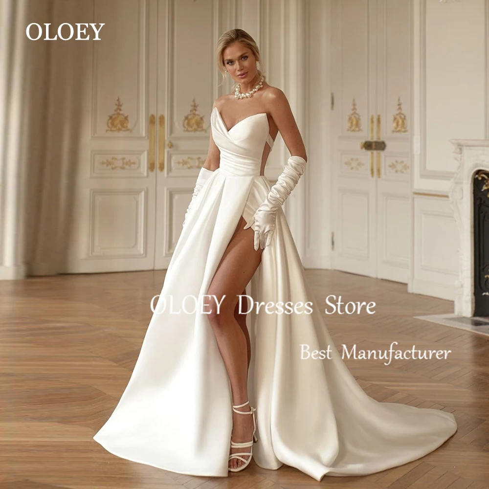 OLOEY Luxury Ivory A Line Wedding Dresses V Neck Pleats Satin Bridal Gowns Sleeveless Side Slit Floor Length Buttons Customized
OLOEY Luxury Ivory A Line Wedding Dresses V Neck Pleats Satin Bridal Gowns Sleeveless Side Slit Floor Length Buttons Customized