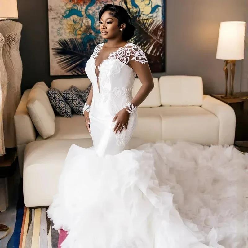 Customized African Shinny Beads Lace Wedding Dress for Bride Robes De Cascading Ruffles Full Sleeves Garden Bridal Gown
Customized African Shinny Beads Lace Wedding Dress for Bride Robes De Cascading Ruffles Full Sleeves Garden Bridal Gown